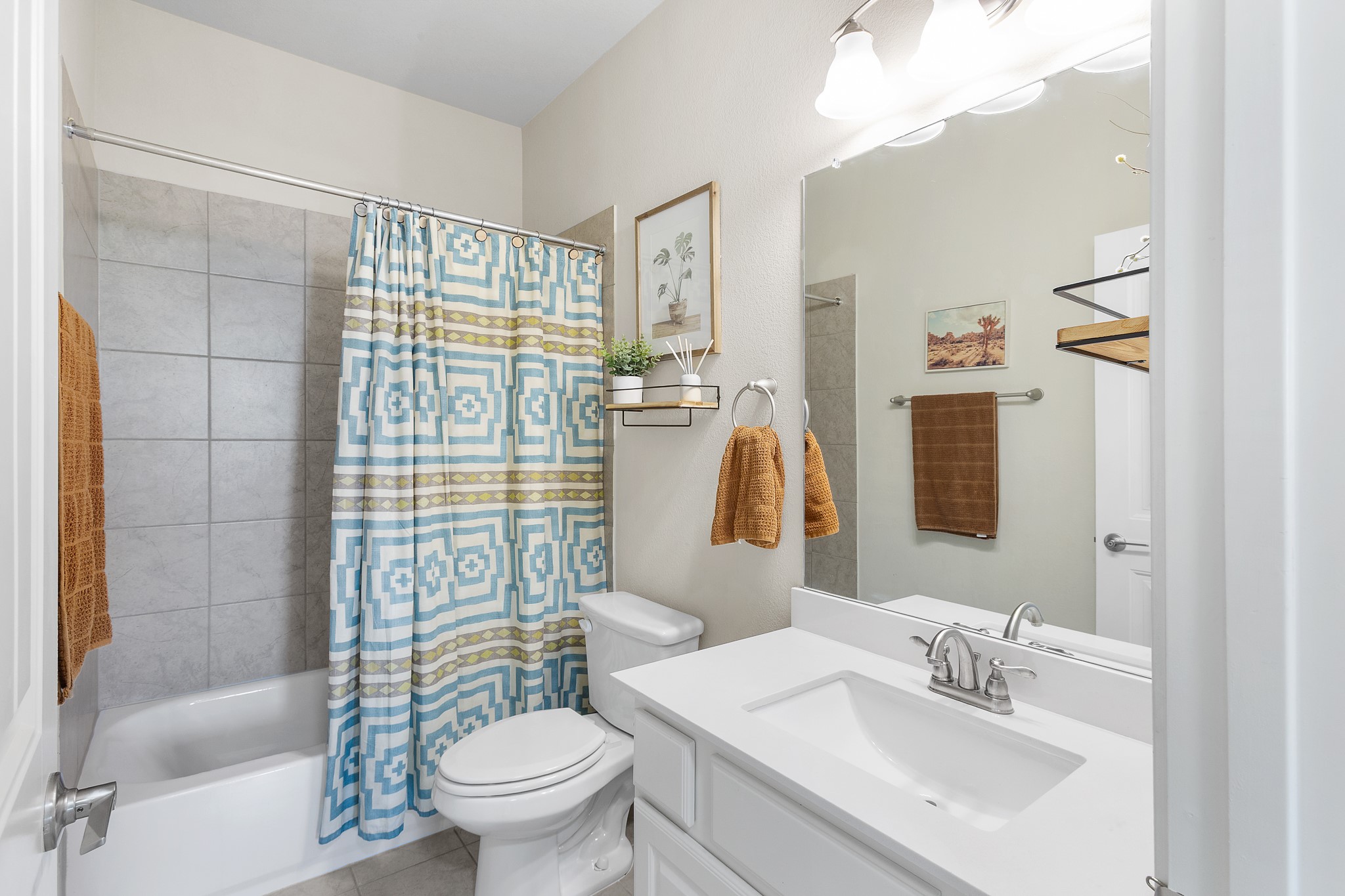 8916 Cattle Baron Path Austin, TX 78747 - Photo 28 of 37 a bathroom with a sink toilet and shower