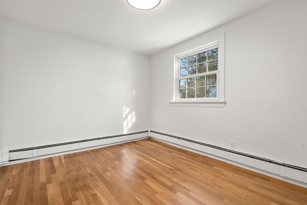 31 College Road Wellesley, MA 02482 - Photo 24 of 38 an empty room with a window