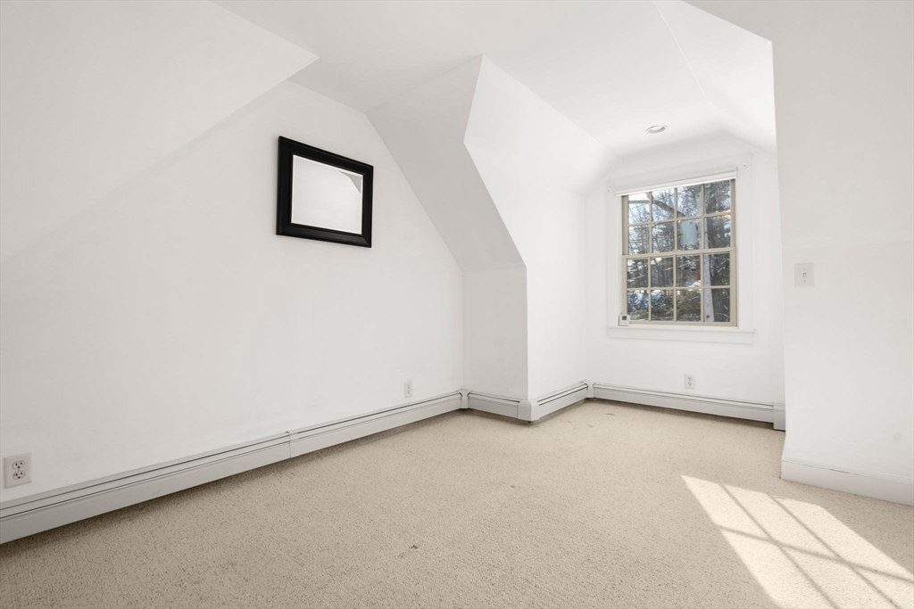 31 College Road Wellesley, MA 02482 - Photo 31 of 38 an empty room with windows