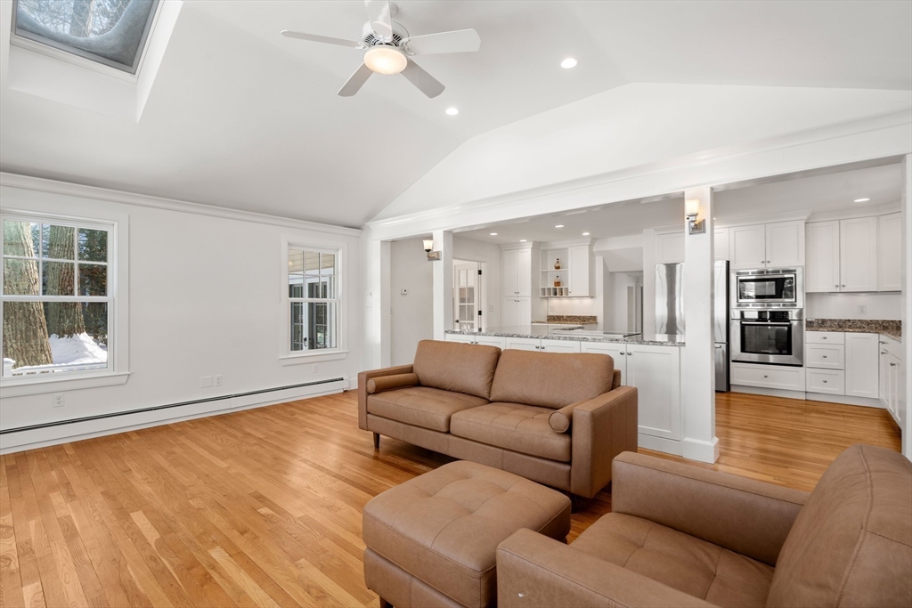 31 College Road Wellesley, MA 02482 - Photo 10 of 38 a living room with furniture and kitchen view