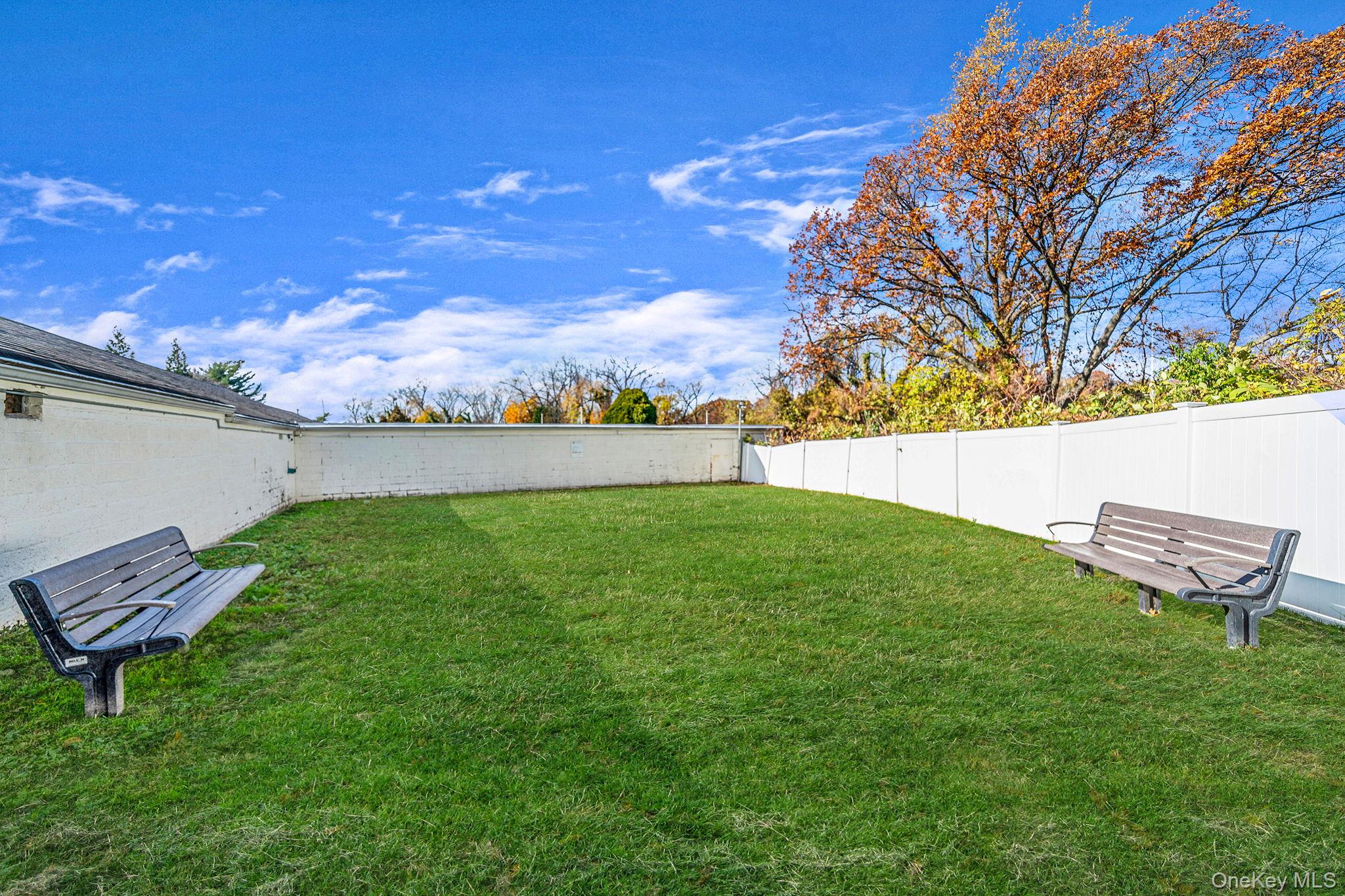 8 Terrace Circle, Unit 1G Great Neck, NY 11021 - Photo 16 of 17 a view of outdoor space and yard