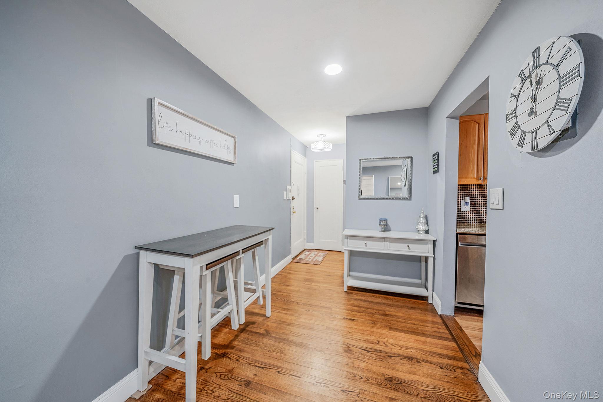 8 Terrace Circle, Unit 1G Great Neck, NY 11021 - Photo 4 of 17 a view of a hallway with entryway