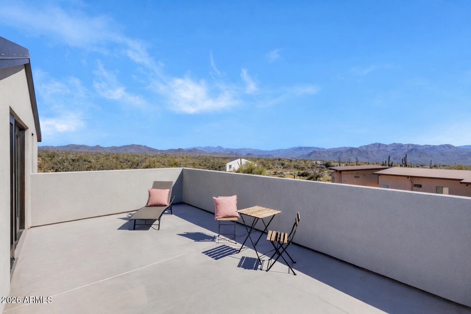 16705 East Ranch Road Scottsdale, AZ 85262 - Photo 52 of 53 a view of a lake with a bench and lake view