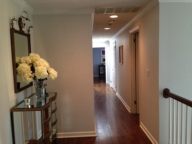 207 Jonathan Road New Canaan, CT 06840 - Photo 18 of 30 a view of a hallway to room with wooden floor