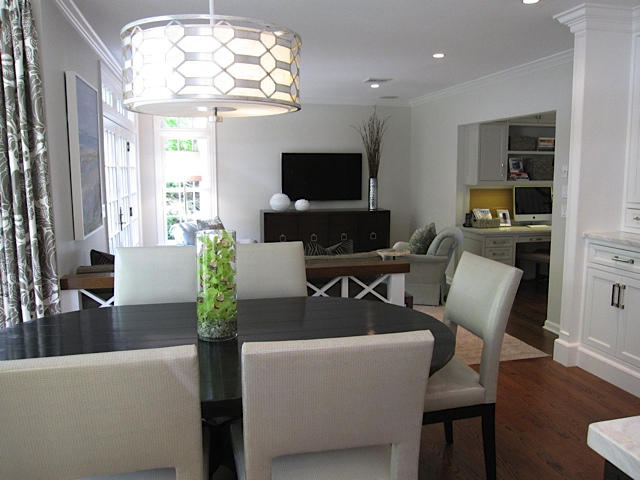 207 Jonathan Road New Canaan, CT 06840 - Photo 10 of 30 a living room with furniture a flat screen tv and kitchen view