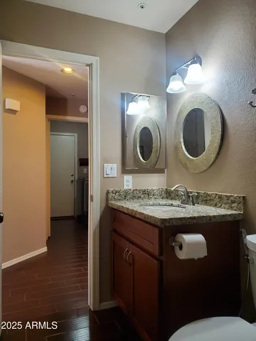 a view of a hallway with a chandelier
