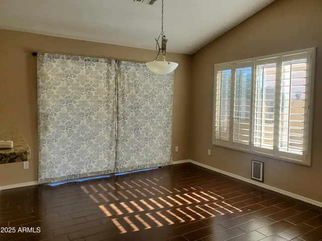 a kitchen with granite countertop a sink and a stove