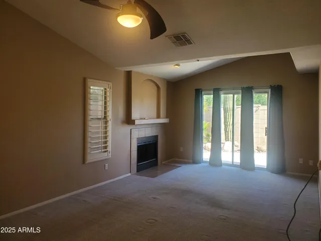a bathroom with a bathtub and window