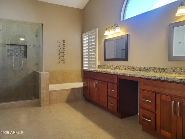 a backyard of a house with seating space