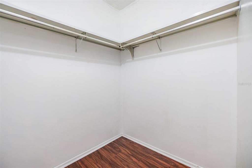 701 Poinsettia Road, Unit 306 Belleair, FL 33756 - Photo 16 of 25 a view of an empty walk in closet