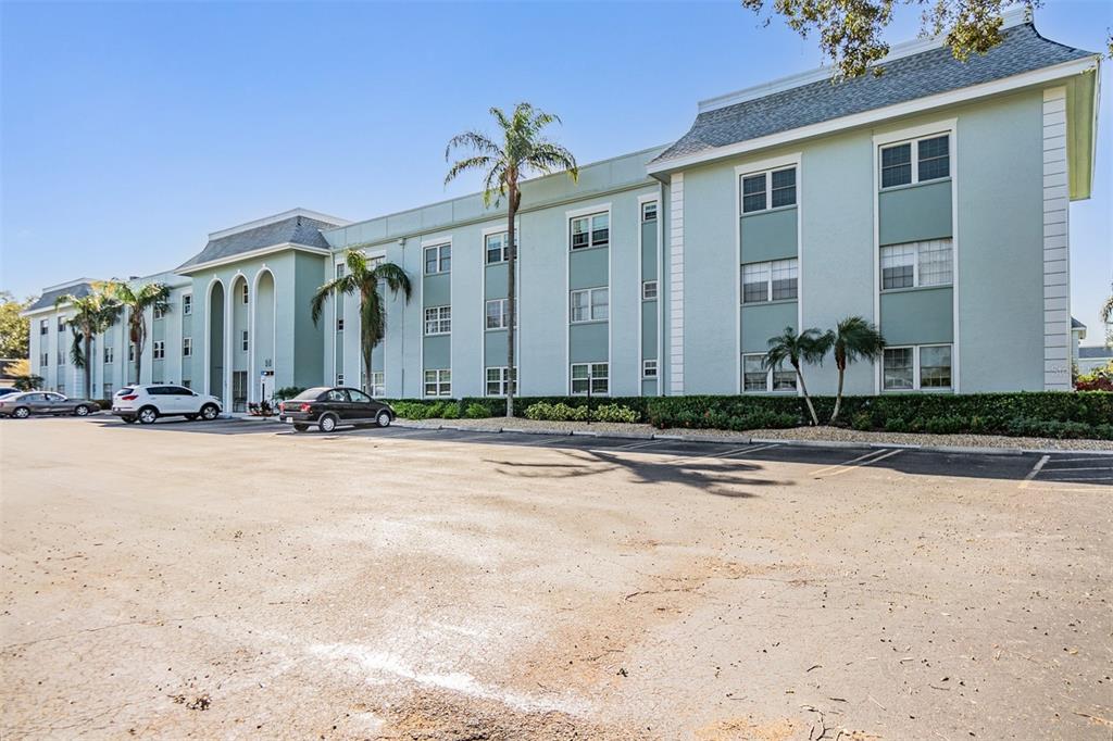701 Poinsettia Road, Unit 306 Belleair, FL 33756 - Photo 23 of 25 a view of a building with a street