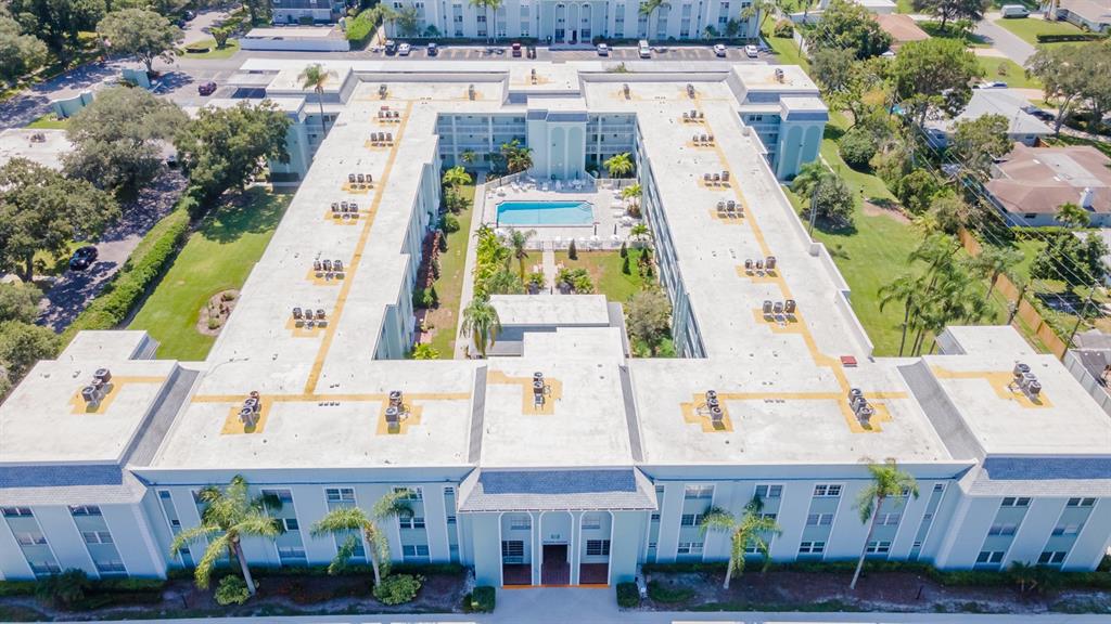 701 Poinsettia Road, Unit 306 Belleair, FL 33756 - Photo 24 of 25 an aerial view of residential houses with outdoor space