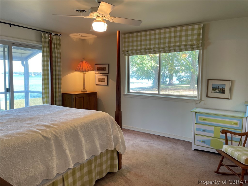 1266 Queenstown Road Lancaster, VA 22503 - Photo 37 of 46 a bedroom with a bed and a window