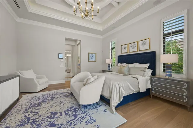 a roof deck with table and chairs