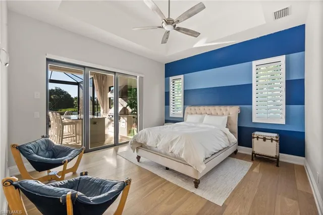 a living room with furniture tv and a fireplace