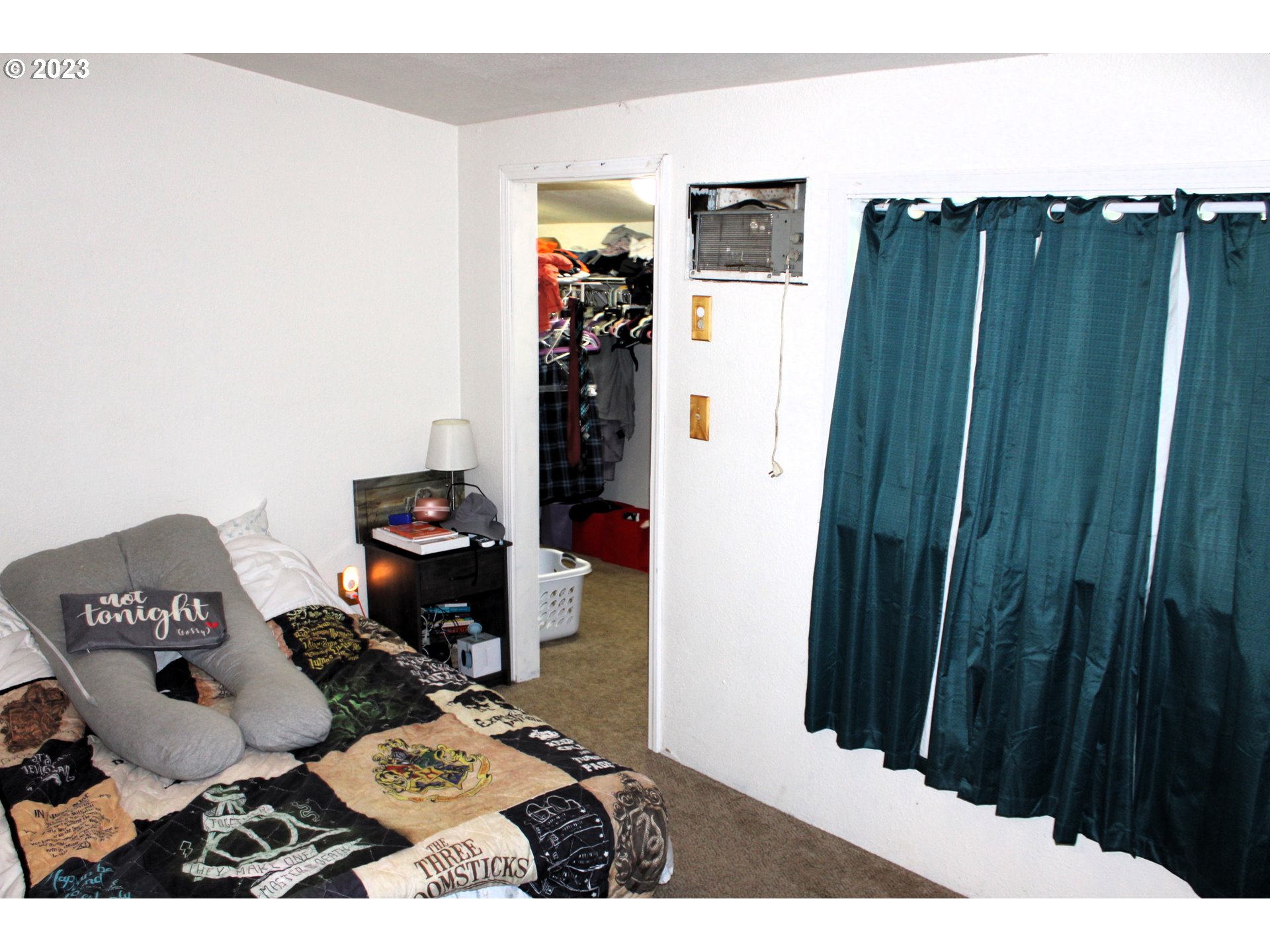 3392 Eagle Valley Road Yoncalla, OR 97499 - Photo 12 of 48 a bed room with a bed and a television