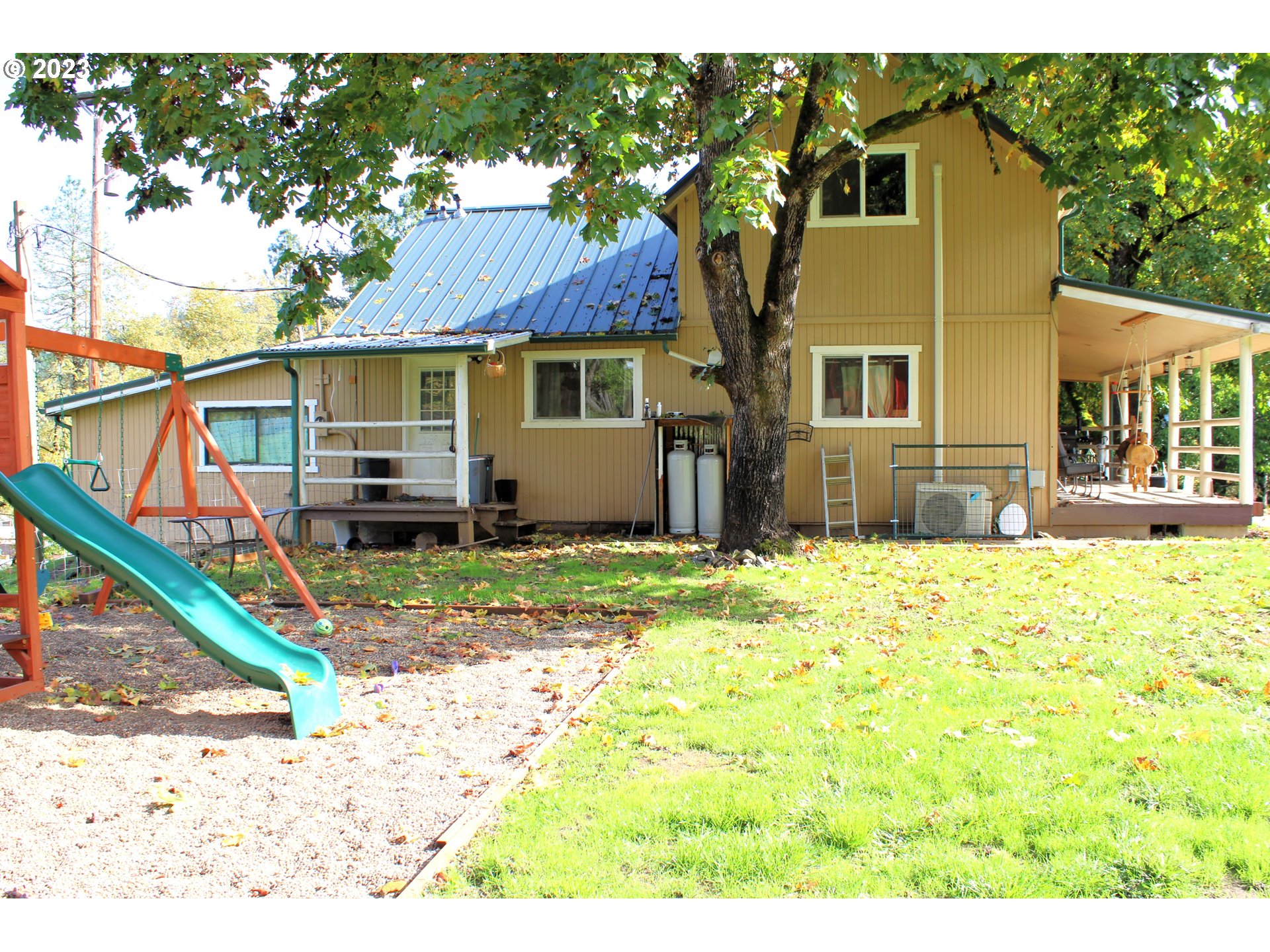 3392 Eagle Valley Road Yoncalla, OR 97499 - Photo 18 of 48 a view of a house with a yard