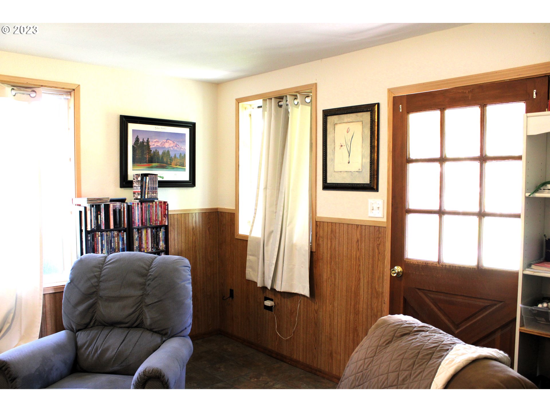 3392 Eagle Valley Road Yoncalla, OR 97499 - Photo 22 of 48 a living room with furniture and a window