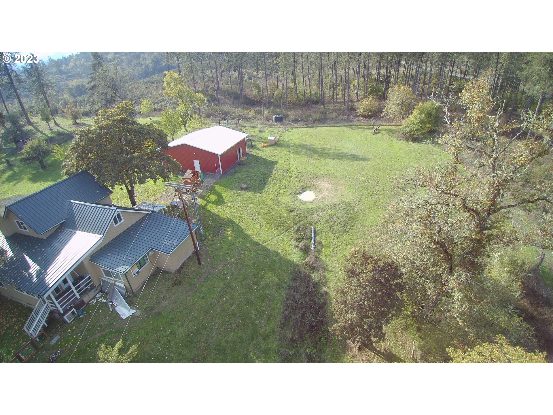 3392 Eagle Valley Road Yoncalla, OR 97499 - Photo 46 of 48 a open area with lots of trees