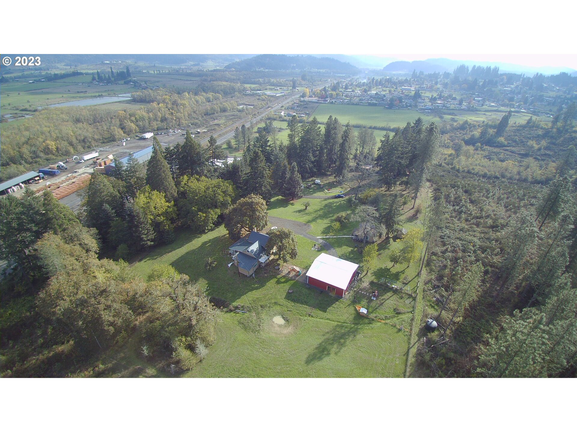 3392 Eagle Valley Road Yoncalla, OR 97499 - Photo 48 of 48 a view of a city from a lake