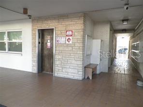 911 Washington Avenue Southwest, Unit 304 Largo, FL 33770 - Photo 4 of 26 a view of an empty room and a window