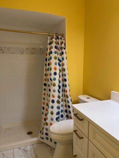 9132 South Pulaski Road, Unit 2E Oak Lawn, IL 60453 - Photo 17 of 22 a bathroom with a sink toilet and shower