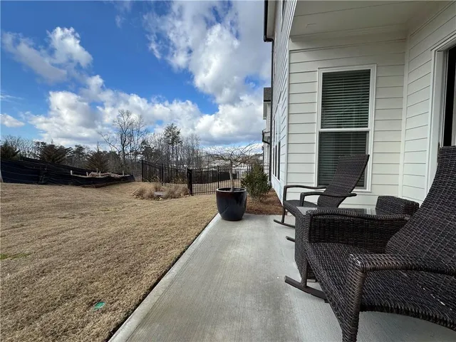 a view of a terrace with sitting area