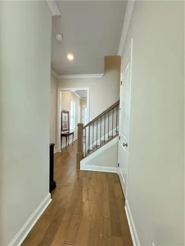 a view of entryway with wooden floor