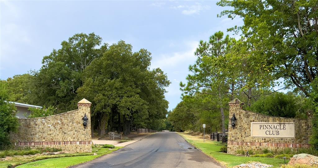 223 Colonial Drive Mabank, TX 75156 - Photo 5 of 10 a sign board with buildings in the background