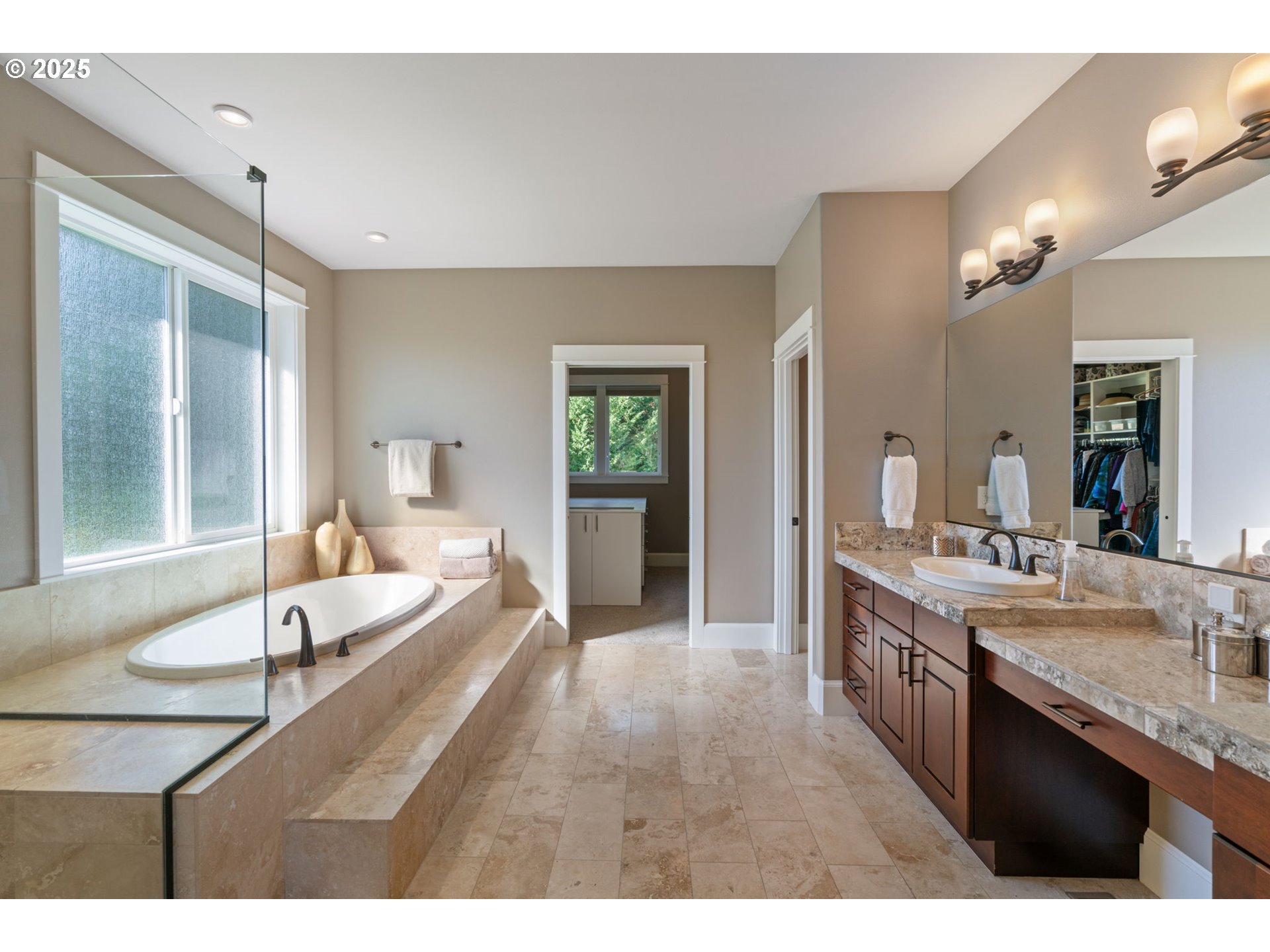 1613 Southwest 25th Circle Battle Ground, WA 98604 - Photo 19 of 48 a large bathroom with a sink and a large mirror