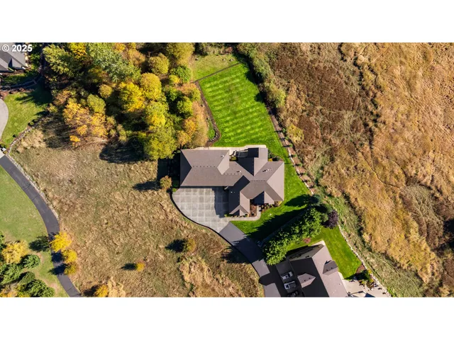 a black and white photo of a tennis court