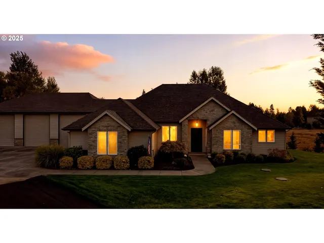 a black and white house with a outdoor space