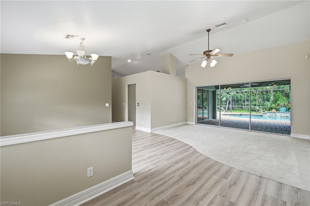 2053 17th Street Southwest Naples, FL 34117 - Photo 6 of 47 a view of an empty room with a window