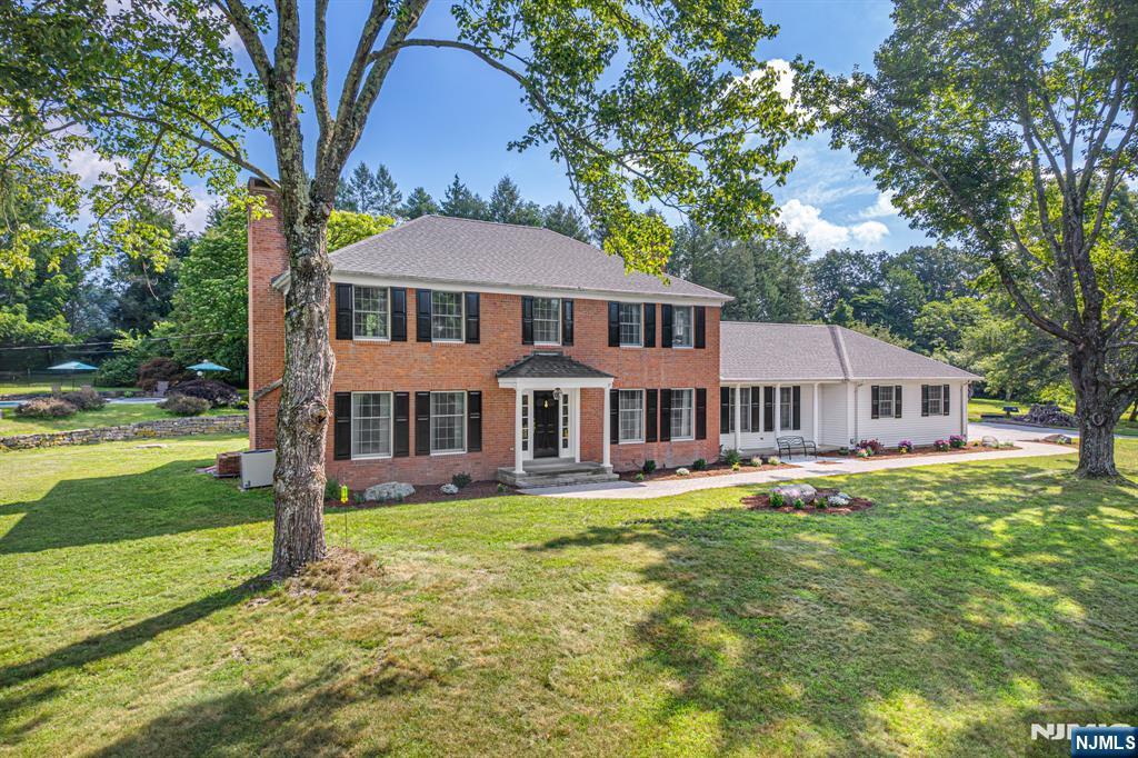208 Willows Road Newton, NJ 07860 - Photo 1 of 44 a front view of a house with garden