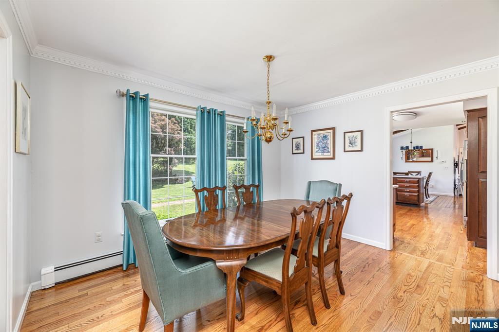 208 Willows Road Newton, NJ 07860 - Photo 14 of 44 a view of a dining room with furniture window and wooden floor