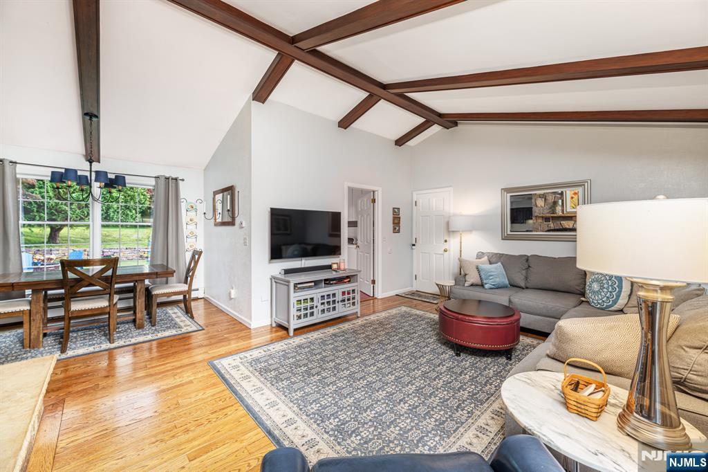 208 Willows Road Newton, NJ 07860 - Photo 17 of 44 a living room with furniture and a flat screen tv