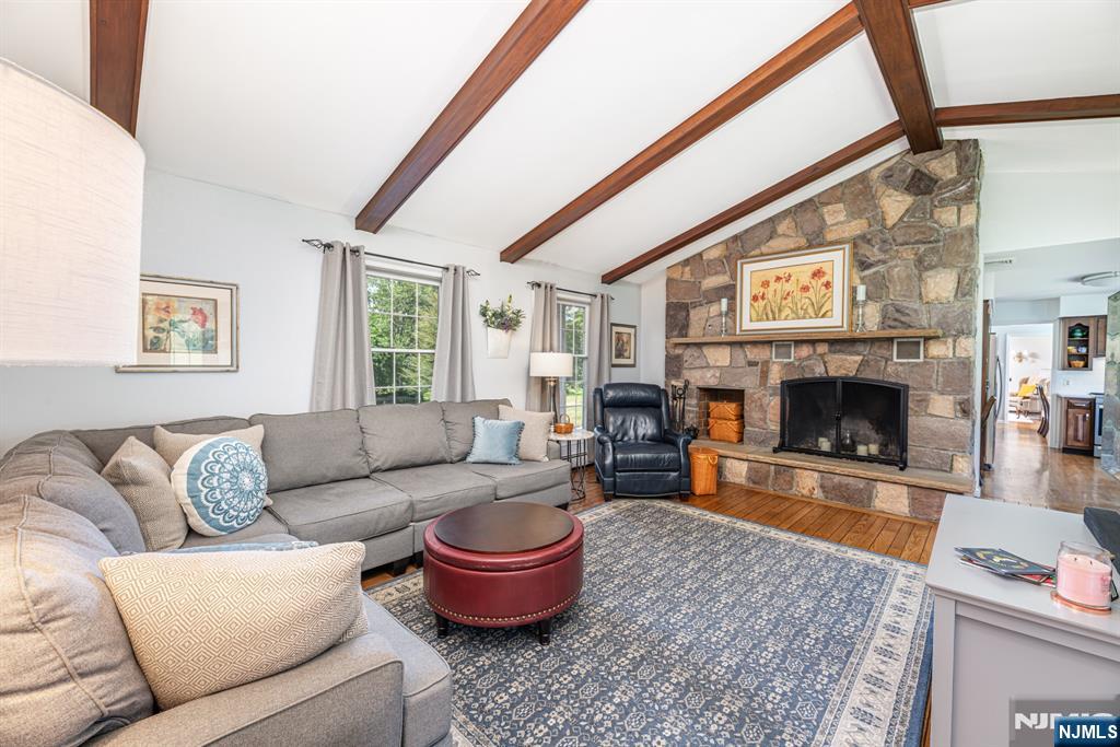 208 Willows Road Newton, NJ 07860 - Photo 18 of 44 a living room with furniture and a fireplace