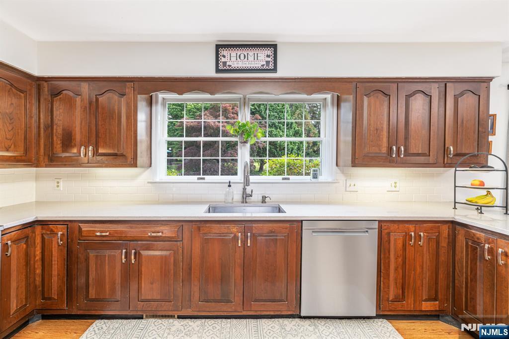 208 Willows Road Newton, NJ 07860 - Photo 20 of 44 a kitchen with stainless steel appliances granite countertop a sink and a cabinets