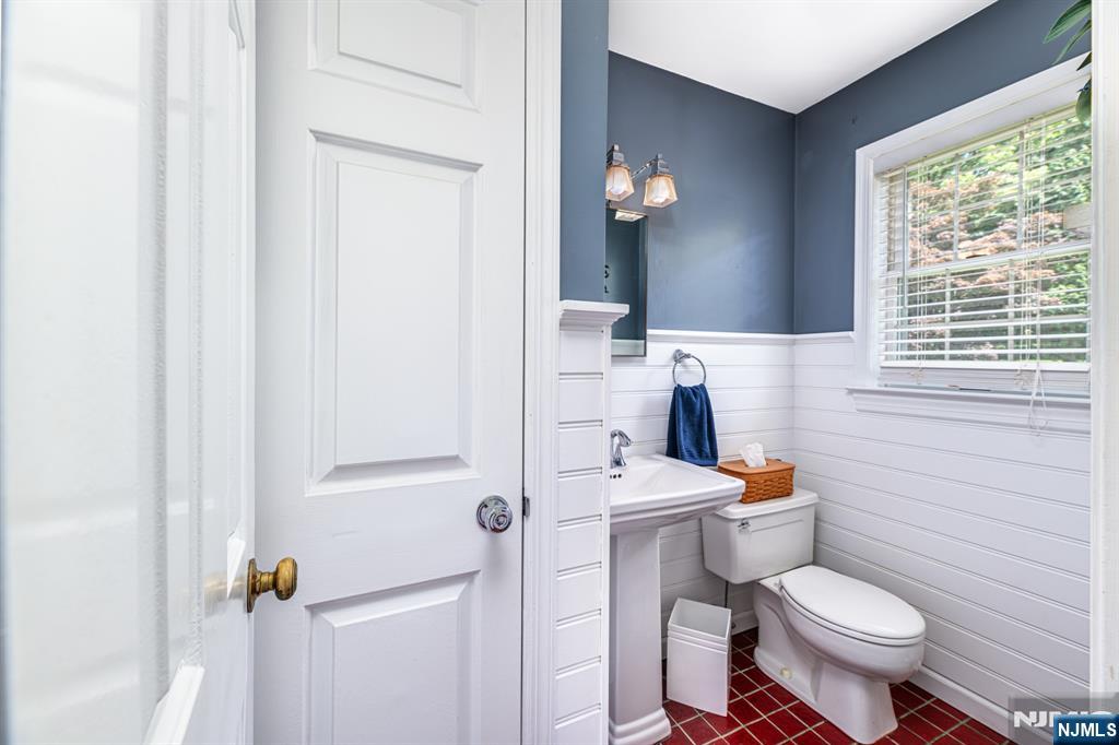 208 Willows Road Newton, NJ 07860 - Photo 25 of 44 a bathroom with a sink toilet mirror and tub