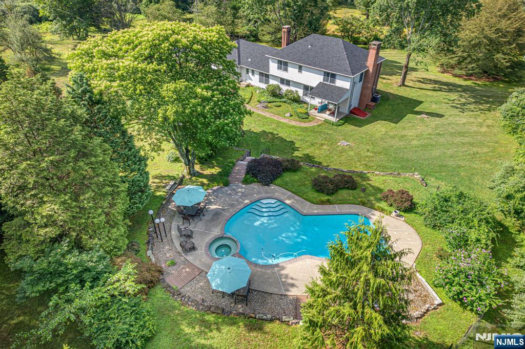 208 Willows Road Newton, NJ 07860 - Photo 5 of 44 a view of a table and chairs in backyard