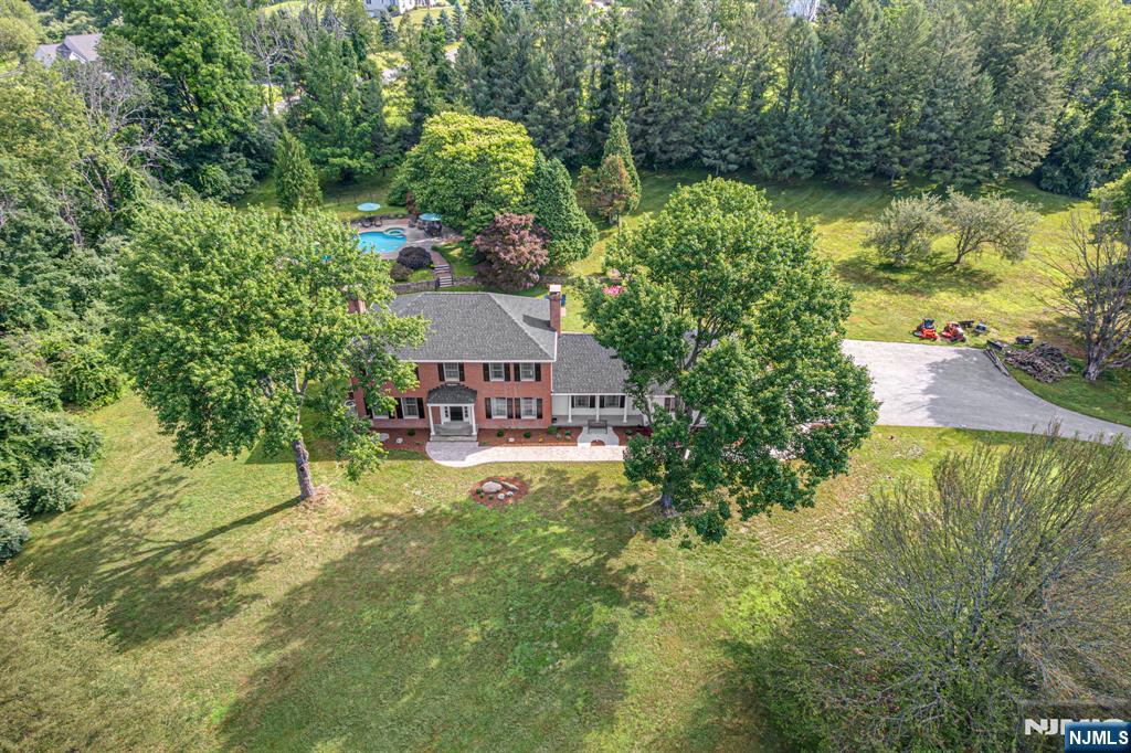 208 Willows Road Newton, NJ 07860 - Photo 7 of 44 a house view with a garden space