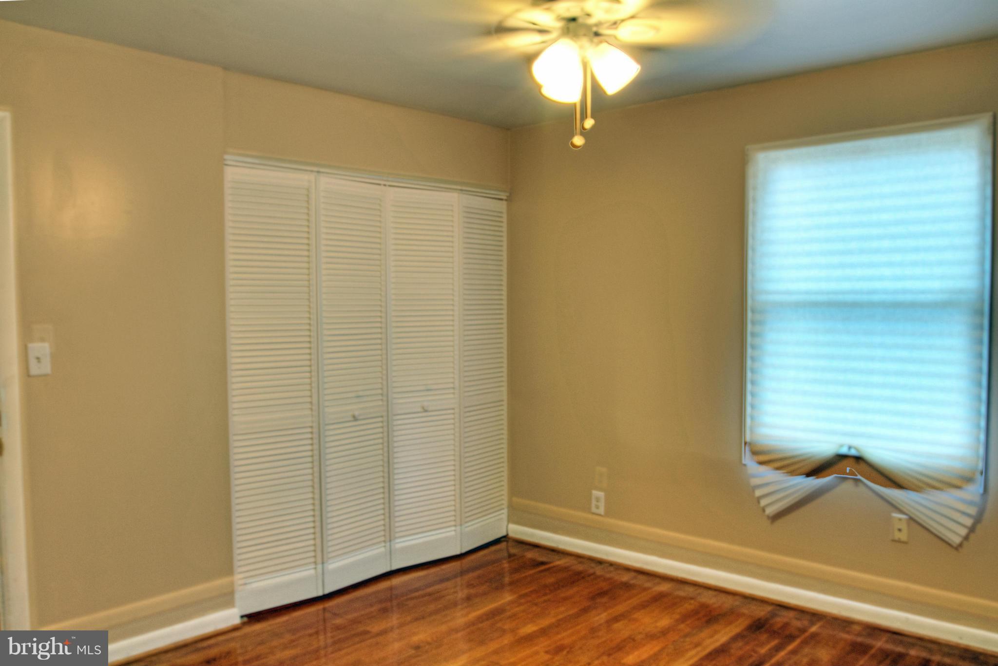 3705 Collier Road Randallstown, MD 21133 - Photo 20 of 30 a view of a livingroom with a chandelier