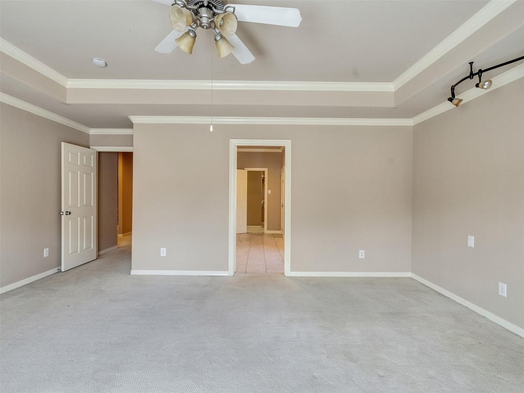 1502 Olive Place Houston, TX 77077 - Photo 15 of 27 Master Suite with crown molding, soft carpet - ideal for privacy and comfort.