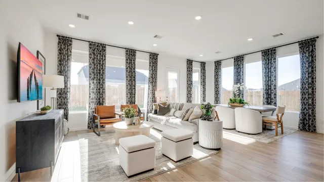 a bed room with bed and large window