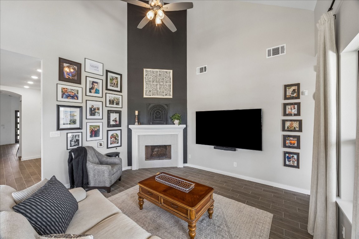438 Livermore Street Webster, TX 77598 - Photo 12 of 34 a living room with furniture and a flat screen tv
