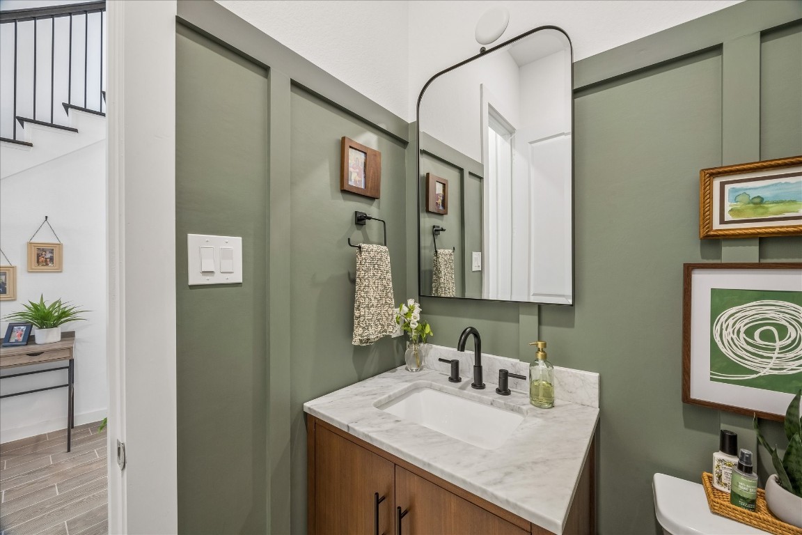 438 Livermore Street Webster, TX 77598 - Photo 17 of 34 a bathroom with a sink a vanity and a mirror