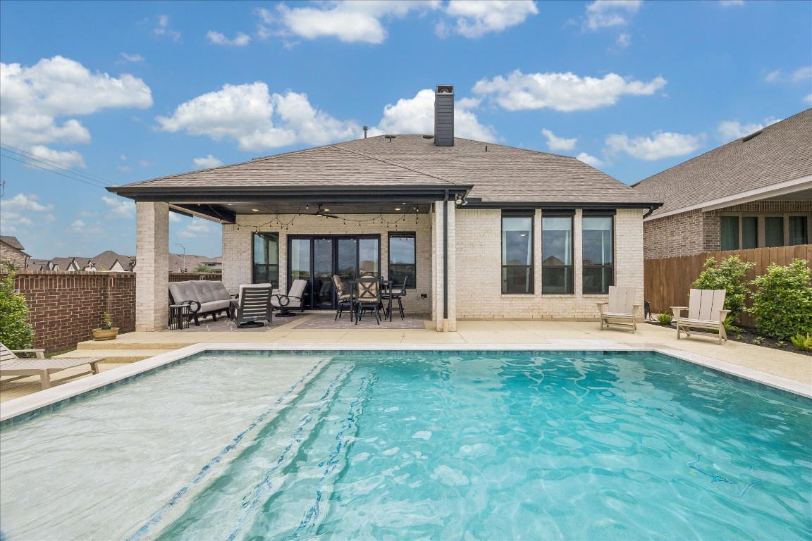 438 Livermore Street Webster, TX 77598 - Photo 33 of 34 a view of a house with sitting area and furniture