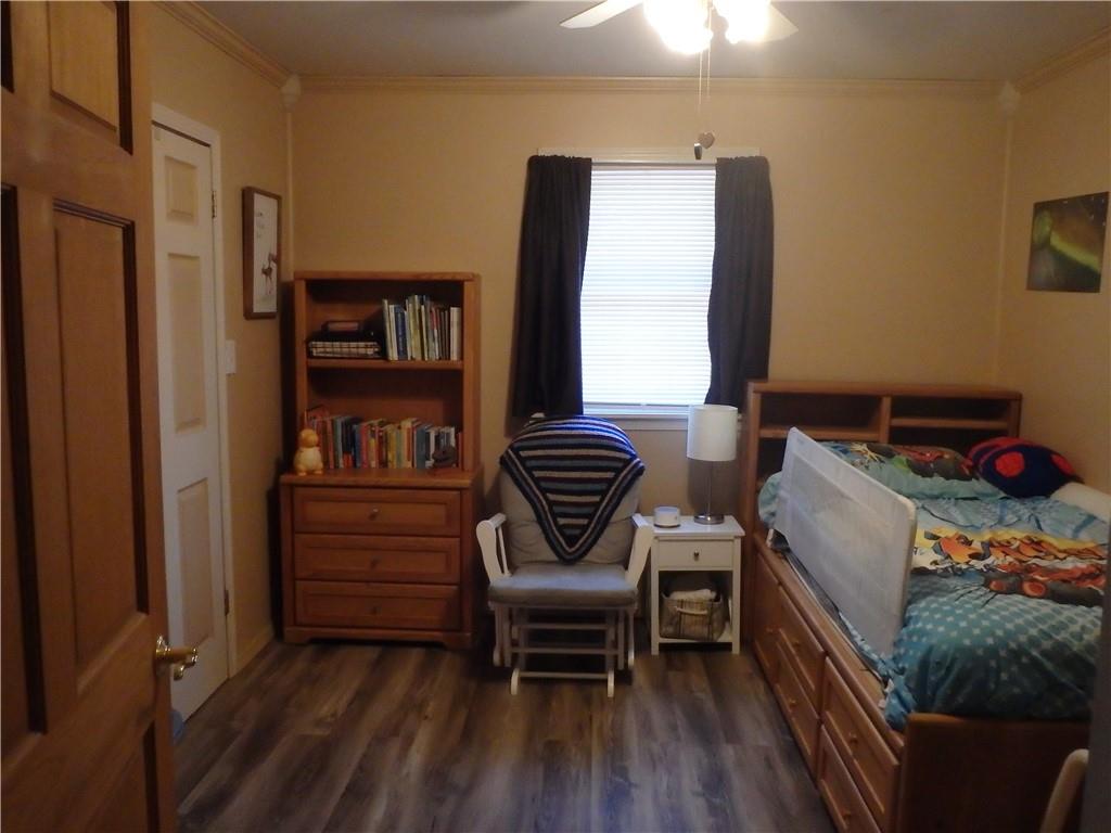 109 Youkers Road Butler, PA 16001 - Photo 11 of 30 a bedroom with a bed and wooden floor