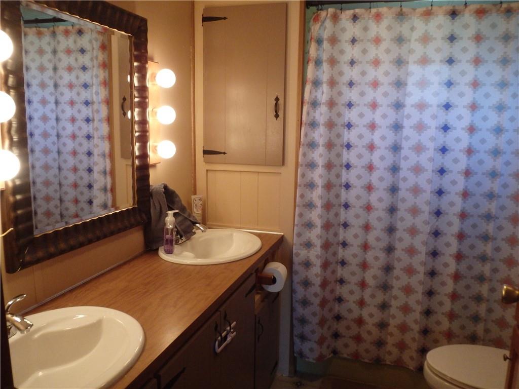 109 Youkers Road Butler, PA 16001 - Photo 14 of 30 a bathroom with a sink and a mirror