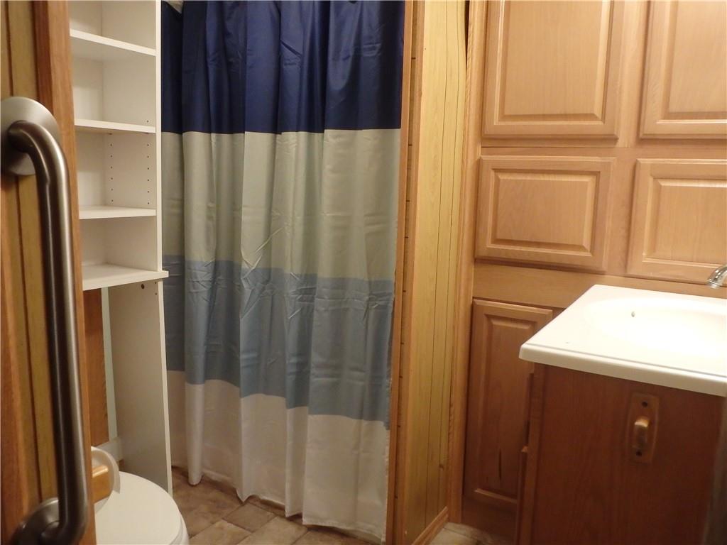 109 Youkers Road Butler, PA 16001 - Photo 22 of 30 a bathroom with a sink a toilet and shower